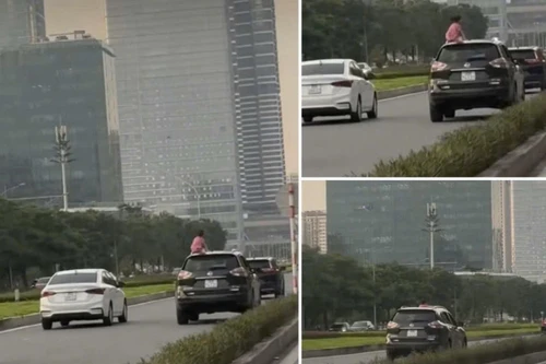 Lý giải của tài xế ô tô để cháu bé... ngồi trên nóc xe ở Hà Nội