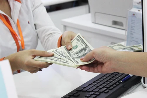 Bác tin đồn điều chỉnh tăng tỷ giá