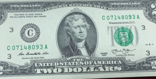 Phá đường dây mua bán USD giả