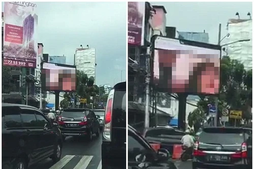 Nhân viên IT phát cảnh nóng lên biển quảng cáo trung tâm Jakarta