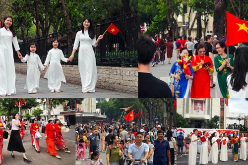 Người Hà Nội tự hào mang cờ Tổ quốc tô điểm phố phường rực rỡ