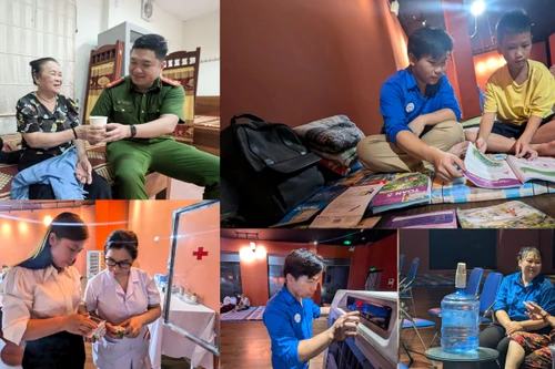 Ảnh: Người dân vùng ngập do nước sông Hồng lên cao ở Hà Nội được di dời đến nơi an toàn