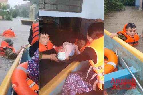 Xúc động hình ảnh Công an xã lội nước sâu đẩy xuồng cứu cháu bé sơ sinh khỏi lũ dữ