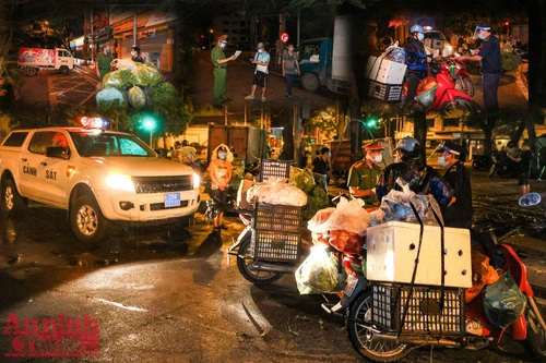 [ẢNH] Hà Nội: Lực lượng chức năng trắng đêm đội mưa dẹp "chợ rau" tự phát né quy định phòng dịch
