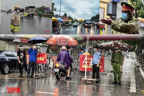 [ẢNH] Công an Hà Nội đội mưa lớn kiểm soát "ngoài chặt, trong chặt" để ngăn dịch bệnh