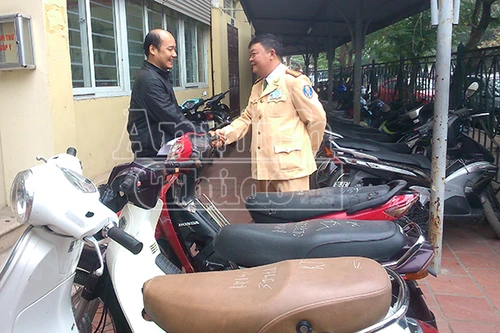 Nhận lại xe máy sau 4 năm bị mất