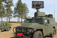 [ẢNH] Xe Nga vừa đi vừa phóng tên lửa, xé nát máy bay không người lái