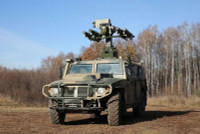 [ẢNH] Xe Nga vừa đi vừa phóng tên lửa, xé nát máy bay không người lái