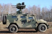 [ẢNH] Xe Nga vừa đi vừa phóng tên lửa, xé nát máy bay không người lái