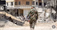 Thủ lĩnh nhóm Jaish al-Islam nộp vũ khí và rời khỏi Douma