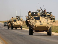 [ẢNH] Đoàn xe quân đội Mỹ bị tấn công tại Syria