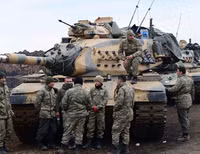 [ẢNH] Thổ Nhĩ Kỳ đe dọa dùng S-400 cản bước tiến của quân đội Syria