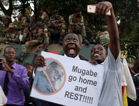 Chùm ảnh dân Zimbabwe nhảy múa trên phố sau khi Tổng thống từ chức