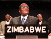 Chùm ảnh dân Zimbabwe nhảy múa trên phố sau khi Tổng thống từ chức