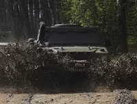 [ẢNH] Xe bọc thép Nga chuẩn NATO bị trúng mìn của quân đội Syria