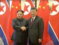 Những khoảnh khắc ấn tượng trong chuyến thăm Trung Quốc của ông Kim Jong-un