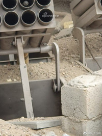 [ẢNH] Phiến quân ngụy trang trận địa pháo phóng loạt 