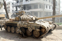 [ẢNH] Phận bi tráng của chiến tăng T-55MV Syria trên cánh đồng chết Idlib