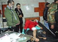 Bị quân chính phủ bao vây, nhiều phiến quân ở Đông Ghouta giao nộp vũ khí