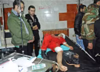 Bị quân chính phủ bao vây, nhiều phiến quân ở Đông Ghouta giao nộp vũ khí