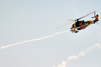 [ẢNH] Trực thăng vũ trang Syria bất ngờ tấn công dữ dội phiến quân tại Lattakia