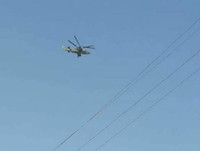 [ẢNH] Trực thăng vũ trang Nga truy đuổi máy bay không người lái Mỹ trên bầu trời Syria?