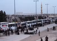 Hàng nghìn phiến quân và dân thường rời khỏi Đông Ghouta