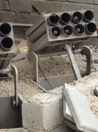 [ẢNH] Phiến quân ngụy trang trận địa pháo phóng loạt 