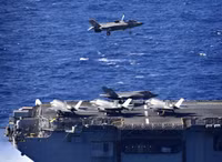 [ẢNH] Siêu tàu đổ bộ cùng F-35B của Mỹ rầm rập tập trận tại cửa ngõ biển Đông