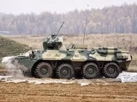[ẢNH] Xe bọc thép BTR-82A của Nga né thiết giáp Mỹ tại Syria