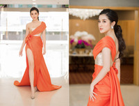 Diện váy xẻ cao ngút Huyền My cẩn thận che chắn tránh sự cố