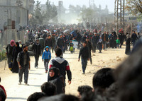 Hàng nghìn phiến quân và dân thường rời khỏi Đông Ghouta