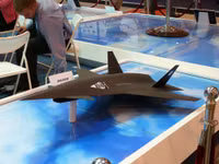 [ẢNH] Trung Quốc bất ngờ ra mắt UAV tàng hình nhằm phá thế trận của 'chiến thần' F-22 Mỹ