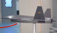 [ẢNH] Trung Quốc bất ngờ ra mắt UAV tàng hình nhằm phá thế trận của 'chiến thần' F-22 Mỹ