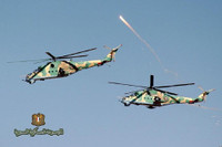 [ẢNH] Trực thăng vũ trang Syria bất ngờ tấn công dữ dội phiến quân tại Lattakia