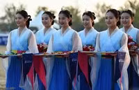 Ngắm 'đoàn mỹ nữ' Triều Tiên chuẩn bị đến Hàn Quốc
