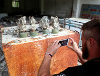 [Ảnh] Vì sao du khách đổ xô tới thành phố 