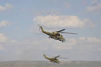 [ẢNH] Trực thăng vũ trang Syria bất ngờ tấn công dữ dội phiến quân tại Lattakia