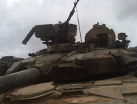 [ẢNH] Tử chiến tại Al-Bukamal, IS thiêu rụi xe tăng hiện đại T-90A của Syria