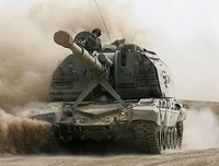 [ẢNH] Mỹ lo lắng khi Nga bí mật chuyển giao đạn pháo thông minh cho Syria