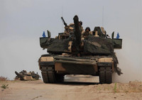 [ẢNH] Xe tăng Mỹ bất ngờ quay lại Syria, tình hình Trung Đông đột ngột căng thẳng