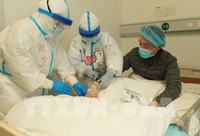 [ẢNH] Báo Anh hoài nghi khi thấy hàng nghìn lọ tro cốt chất tại nhà tang lễ Vũ Hán