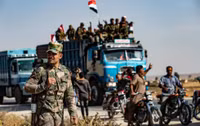 [ẢNH] Quân đội Syria cùng vũ khí hạng nặng ào ạt trở lại thị trấn Tal Tamr