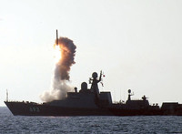 [ẢNH] Chiến hạm Nga dội mưa tên lửa hành trình Kalibr vào thành phố Aleppo