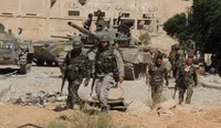 [ẢNH] Quân đội Syria bất ngờ thua bỏ cả xe tăng chạy khỏi một số vị trí tại tử địa Đông Ghouta