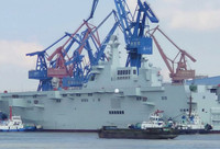 [ẢNH] Tàu đổ bộ trực thăng của Trung Quốc chạy thử nghiệm khi đang thi công dang dở