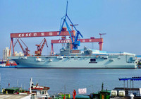 [ẢNH] Tàu đổ bộ trực thăng của Trung Quốc chạy thử nghiệm khi đang thi công dang dở