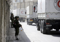 13 xe cứu trợ nhân đạo đã vào được vùng đông Ghouta, Syria