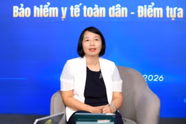 Phó Giám đốc BHXH Hà Nội Nguyễn Thị Tám trả lời tại buổi Tọa đàm