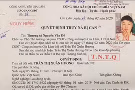 Vận động người đàn bà bị truy nã nguy hiểm ra đầu thú